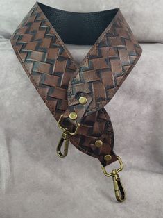 Please visit our Etsy shop at:  https://alforddesignsltd.etsy.com and check out our large assortment of leather replacement straps - lots of colors, and textures for bags, purses,  briefcases, and more! Cognac and Black Embossed braided genuine cowhide leather replacement strap.  (Please note that this is a 2" wide strap in the photo) has a black solid leather back.  Introducing our exquisite Custom Made Genuine Embossed Cowhide Leather Cut-Resistant Replacement Straps, that include sophisticati Adjustable Leather Crossbody Strap With Handles, Brown Crossbody Bag Strap With Leather Handles, Adjustable Leather Handle Crossbody Shoulder Strap, Brown Leather Crossbody Bag Strap, Adjustable Brown Shoulder Strap, Luxury Adjustable Bag Strap For Everyday Use, Adjustable Brown Leather Bag Strap, Adjustable Detachable Brown Bag Strap, Adjustable Long Leather Bag Strap