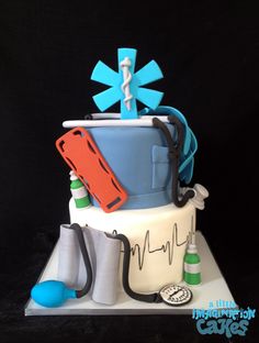 a cake with medical equipment on top of it