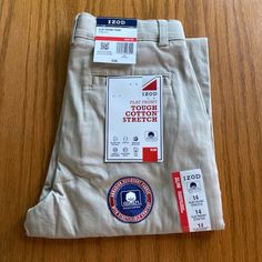 Izod Nwt Boys Pants Size Slim 14, Tan, Flat Front, Tougher Cotton Stretch, Retails $36 #7180 Cotton School Trousers, School Pants Made Of Cotton, Cotton Straight Leg School Bottoms, Cotton Long Pants For School, Boys Khaki Pants, Tan Trousers, Charcoal Dress, Khaki Dress Pants, Navy Dress Pants