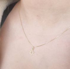 14k solid Gold necklace, star of david gold necklace ,14k gold, everyday necklace, Real Gold Jewelry, Jewish Necklace, Star of david gold necklace Solid 14k Gold necklace with star of david charm hangs on delicate 14k solid gold box chain. **Pendant: Height- total includ loop  15mm / 0.59 inch , width:  10mm / 0.39 inch . **Necklace Lenght:  choose- 16.5 inch/ 41 cm  or  17.5 inch / 44 cm" **14k solid yellow gold box chain.  Please note Please make sure the length of the chain is suitable for yo Yellow Gold Charm Necklace With Star Of David Charm, Magen David Necklace, Jewish Star Necklace, Jewish Necklace, Star Of David Necklace, Jewish Star, Necklace Star, Star Of David Pendant, Real Gold Jewelry