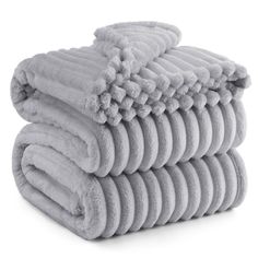 six towels stacked on top of each other