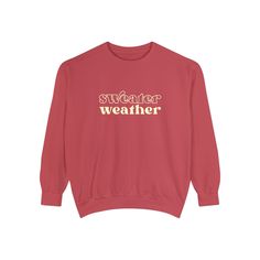 Bundle up, buttercup! Our "Sweater Weather" Sweatshirt is here to wrap you in a cozy embrace warmer than your ex's apology text. This isn't just a sweatshirt – it's a wearable ode to that magical time of year when leaves turn crisp and your dating standards turn flexible. Perfect for sipping pumpkin spice lattes, pretending to enjoy football, or aggressively cuddling your cat while scrolling through dating apps. With this sweatshirt, you're not just embracing autumn, you're practically french-ki Trendy Cotton Sweats With Cozy Fit, Winter Trendy Crew Neck Sweats, Trendy Crew Neck Winter Sweats, Trendy Winter Crew Neck Sweats, Trendy Cozy Fit Cotton Sweater, Winter Graphic Print Sweatshirt, Winter Graphic Print Comfortable Sweatshirt, Trendy Winter Sweatshirt With Comfortable Fit, Comfortable Graphic Print Winter Sweatshirt