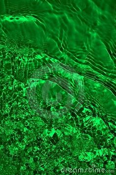 green water with ripples and bubbles in it