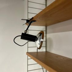 a light that is on top of a shelf