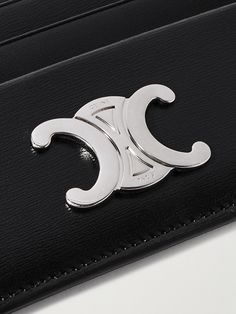 CELINE HOMME's cardholder bears its 'Triomphe' emblem, named after the Parisian monument, in striking proportions. It's made from abrasion-resistant textured-leather and has six slots, plus a central compartment for folded notes. Luxury Leather Wallet With Silver-tone Logo, Luxury Formal Wallets With Silver-tone Logo, Luxury Leather Wallets With Metal Logo, Folded Notes, Summer Sunglasses, Fine Jewelry Designers, Luxury Gifts, Card Holder Leather, Mr Porter