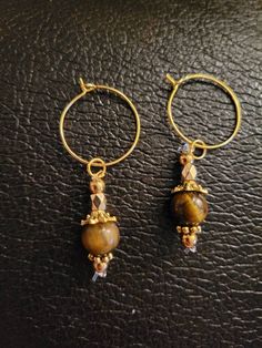 Excited to share the latest addition to my #etsy shop: Tigers Eye Beaded Gold Earrings https://etsy.me/3csz5ME #gold #brown #women #earwire #minimalist #tigerseye #beaded #dangle #drop Beauty In Nature, Fredericksburg Va, Tiger Eye Beads, Brown Women, Tigers Eye, Ear Wire, How To Feel Beautiful, Tiger Eye, Clear Crystal