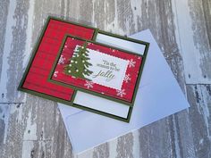 a card with a christmas tree on it