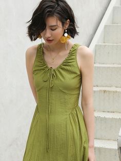 Long, A-line sleeveless dress in lightweight fabric. V-neck with drawstring and back zip.- Maxi- Sleeveless- A-line Summer A-line Dress With Tie Fastening, Casual A-line Midi Dress With Tie Straps, Casual A-line Dress With Tie Back, Green Summer Midi Dress With Gathered Neckline, Green Midi Dress With Gathered Neckline For Summer, Casual V-neck Dress With Gathered Neckline, Casual Sleeveless Dress With Tie Back, Summer A-line Maxi Dress With Gathered Neckline, Casual Sleeveless Mini Dress With Tie Straps