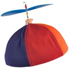 a red, orange and blue hat with a toy mouse on it's side