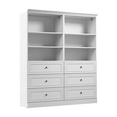 an empty white bookcase with drawers