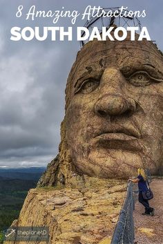 a person standing in front of a giant statue with the words 8 amazing attractions south dakota