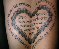 a heart shaped tattoo with words written on it