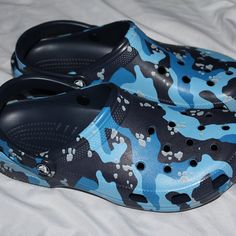 Crocs Classic Printed Camo Navy Blue Clog Slip On 206454-4hq Casual Blue Sandals With Rubber Sole, Casual Blue Clogs For Spring, Blue Non-slip Synthetic Clogs, Blue Slip-on Clogs For Outdoor, Comfortable Blue Synthetic Clogs, Blue Closed Toe Clogs For Outdoor, Blue Slip-on Spring Clogs, Blue Slip-on Clogs For Spring, Blue Beach Clogs With Cushioned Footbed