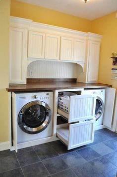 an appliance is displayed on the front page of a mobile phone application, displaying a photo of a washer and dryer