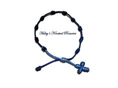 Hand Made Knotted Rosary Bracelet Choice of by greatguarantee Adjustable Rosary With 8mm Beads In Cross Shape, Handmade Adjustable Rosary Bracelet As Gift, Handmade Adjustable Rosary Bracelet For Gifts, Handmade Adjustable Cross Bracelets, Adjustable Rosary Bracelet Gift, Blue Cross Bracelets As Gift, Blue Cross Bracelets For Gifts, Adjustable Hand-strung Rosary As Gift, Handmade Adjustable Spiritual Rosary