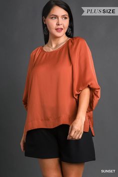 Round neck, curvy blouse. Comes in multiple colors. Perfect for the fall season. Satin material. Puffy elbow length sleeves. Materials: 100% Polyester Brand: Umgee Oversized Blouse With Blouson Sleeves For Fall, Elegant Batwing Sleeve Tops For Fall, Elegant Oversized Tops With Balloon Sleeves, Fall Blouse With Blouson Short Sleeves, Solid Color Tops With Blouson Short Sleeves, Versatile 3/4 Sleeve Blouse For Fall, Fall Blouse With Blouson Sleeves, Fall Blouse With Blouson Sleeves And Short Sleeve, Versatile Fall Blouse With Blouson Sleeves