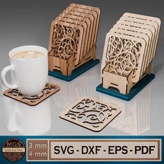 three wooden coasters with designs on them and a cup of coffee in the middle