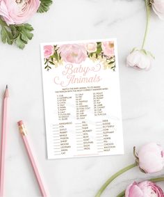 a pink floral wedding game with flowers and pencils