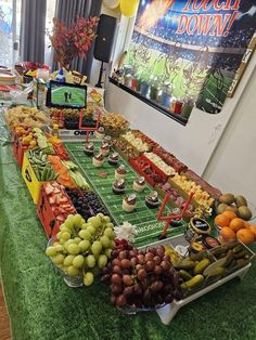 a football themed party with snacks and desserts