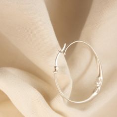 Crescent moon hoop earrings, half moon hoops earrings, delicate moon hoop earrings, Celestial earrings These moon earrings are designed, hand sculpted, cast in silver and finished by hand. You can choose them in matte finishing or high polished finishing! These detailed Moon faced earrings are cast in sterling silver and the diameter is 3.5 cm. We have a SPECIAL OFFER for you! Now, you can choose the whole set (moon earrings and moon ring). Please note to us the size of the ring if you choose th Elegant Crescent Hoop Earrings For Everyday, Elegant Adjustable Small Hoop Wrap Earrings, Adjustable Moon Charm Earrings, Minimalist Crescent Hoop Earrings, Crescent Hoop Earrings With Ear Wire, Minimalist Sterling Silver Hoop Earrings With Moon Charm, Dainty Moon Charm Earrings, Minimalist Metal Hoop Wrap Earrings, Delicate Round Hoop Earrings For Everyday