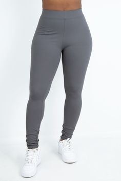 Details : Nylon Spandex Leggings with elastic waistband. Fit : Fitted. True To Size. Super Stretchy. 34 inch inseam Made in : the USA Model is : size S/M Elastane Gym Bottoms, Elastic Elastane Gym Bottoms, Casual 4-way Stretch Tights For Loungewear, Elastane Gym Bottoms With Elastic Fit, Gray Elastane Leggings For Loungewear, Casual 4-way Stretch Tights, Gray Stretch Leggings With Elastic Waistband, Basic Solid Color Elastane Bottoms, Gray Elastane Bottoms