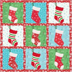 a quilted christmas stocking with snowflakes and stockings on it's sides