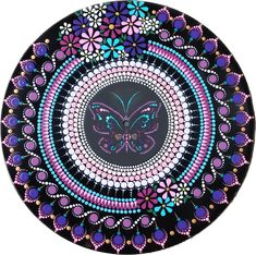 a black plate with purple and blue designs on it