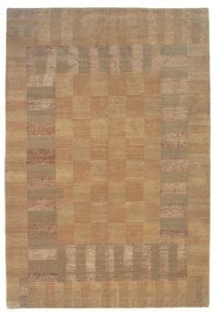 an area rug with squares and rectangles on the top, in light brown tones