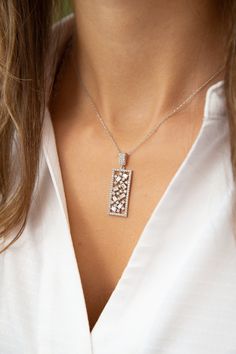 Embrace modern and geometric style with our rectangular necklace, perfect for those who appreciate the clean lines of contemporary design. Elevate your look with the minimalist elegance of our sleek rectangle pendant, designed for timeless and versatile appeal.  Experience the sleek and contemporary charm of our rectangular design necklace, suitable for various occasions and styles. Geometric shape charm necklaces offer clean lines and style, making them an ideal choice for lovers of simplicity. Luxury White Necklace With Rectangular Pendant, Cheap Silver Rectangular Pendant Jewelry, Luxury Rectangular Necklace With Polished Finish, Luxury Rectangular Link Necklace For Anniversary, Elegant Silver Rectangular Necklace, Modern Silver Necklace With Rectangular Stone, Elegant White Gold Necklace With Rectangular Stone, Modern White Square Pendant Jewelry, Elegant White Necklace With Rectangular Pendant