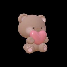 a brown teddy bear holding a pink heart