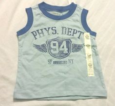 Old Navy Boys Muscle Tank Top Tee Shirt Size 6-12 Months Height:27-29"  Weight: 17-22 lbs. Blue Infant Baby Kids Blue Sleeveless T-shirt With Letter Print, Light Blue Cotton Sports Top, Sporty Sleeveless Top For School, Blue Letter Print Tops For School, Blue Letter Print Top For School, Basic Blue School Tops, Basic Blue Tops For School, Sleeveless Cotton T-shirt For Playwear, Blue Letter Print Top For Playwear