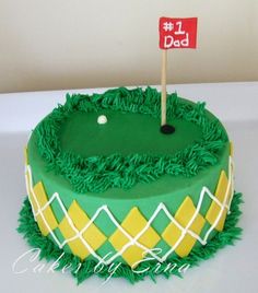 a birthday cake for a golf player with green and yellow icing on the top