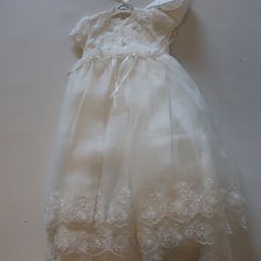 Nwt Baby Girls Sarah Louise Ivory Floral Beaded Long Tulle Dress + Bonnnet 12 Mth Lace And Beads Detailing Tulle Overlay Lined Back Zipper Closure Retail: $175 Length: 29" Material: 100% Polyester New With Tags..Item H (Bag 2) Stavr-Upstairs Loft-1* White Baptism Dress With Lace Bodice For Dress-up, Cream Organza Dress For Baptism, Cream Princess Dress With Lace Trim For Baptism, Cream Lace Baptism Dress For Pageant, Lace Baptism Dress For Pageant With Lace Trim, Lace Baptism Dress For Pageant, Cream Tulle Baptism Dress For Pageant, Cream Tulle Baptism Dress For Pageants, Cream Lace Princess Dress For Pageant