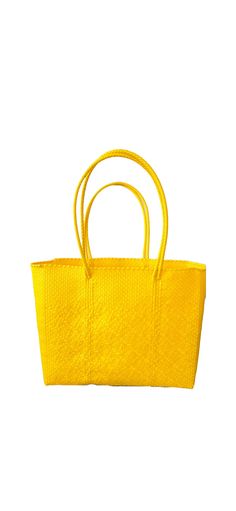 Each bag begins in the small villages of Oaxaca, Mexico, handcrafted by creative and powerful artisans. Each bag is truly a one of a kind piece. Featured in this listing is a yellow tote. *Handwoven *Two handles on each side of bag for extra security  *Easy maintenance  *Eco-friendly *Reusable *Fashionable *Lightweight  *Waterproof *Durable Please feel free to email me if you have any questions. Thank you! Bag measurements:  13.5"H x 16"W x 5.5" D with a strap drop of 6.5." Yellow Artisan Bags For Daily Use, Yellow Artisan Bag For Everyday Use, Artisan Yellow Bag For Everyday Use, Traditional Yellow Bag For Everyday Use, Artisan Yellow Shoulder Bag For Daily Use, Traditional Yellow Bags For Everyday Use, Handwoven Yellow Rectangular Straw Bag, Handwoven Rectangular Yellow Straw Bag, Yellow Rectangular Straw Bag For Everyday