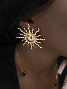 Sign up for our email list and receive 25% off your entire purchase.  Link to sign up: https://bit.ly/4cTm7Aw Embrace the warmth and energy of the sun with our stunning Sun-Shaped Earrings! These earrings are the perfect accessory to brighten your day and illuminate your style. Though they shimmer with the luxurious look of gold, these earrings are crafted from high-quality, lightweight materials, ensuring both comfort and durability. Features: Design: Intricate sun shape, capturing the radiant Gold Sun Earrings, Sun Color, Sun Earrings, Abstract Earrings, Golden Sun, Gold Sun, Brighten Your Day, Jewelry Earrings Studs, Earring Set