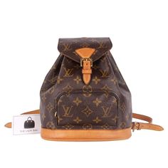 Authentic, pre-loved Louis Vuitton Montsouris PM backpack bag. The PM size is the smallest size of the Montsouris backpacks, which has a spacious compartment that closes with a drawstring and buckled flap for added security. Perfect for men or women and is seen on many celebrities today! This is a luxury retired backpack by Louis Vuitton in very nice condition. You're going to love it! Authenticity date code: See photos Brown Monogram Canvas Backpack, Designer Brown Coated Canvas Backpack, Luxury Brown Monogram Canvas Backpack, Designer Brown Backpack With Adjustable Strap, Classic Brown Monogram Canvas Backpack, Montsouris Pm, Montsouris Backpack, Monogram Backpack, Pre Owned Louis Vuitton