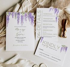 wedding stationery with purple flowers and greenery