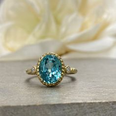 Wow picks! Oval Paraiba Tourmaline And Diamonds Three Stone Ring 14K Yellow Gold Paraiba Twist Band Ring Unique Vintage Paraiba Tourmaline Ring #6154 at $485.00 Choose your wows. 🐕 #DiamondRing #ParaibaRing #VintageParaiba #OvalCut #ParaibaTourmaline #TourmalineRing #TwistBandRing #14kYellowGold #ThreeStoneRing #UniqueRing Yellow Gold Tourmaline Promise Ring, Oval Sapphire Emerald Ring As Birthstone, Oval Tourmaline Emerald Ring In Yellow Gold, Yellow Gold Tourmaline Birthstone Ring, Gold Tourmaline Ring With Accent Stones, Tourmaline Birthstone Ring In Yellow Gold, Round Cut Tourmaline Ring For Anniversary, Tourmaline Round Cut Ring For Anniversary, Tourmaline Round Cut Anniversary Rings