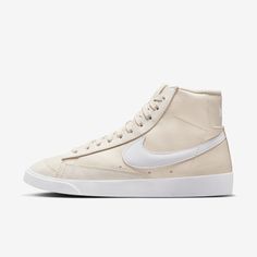 Styled for the ‘70s. Loved in the ‘80s. Classic in the ‘90s. Ready for the future. The Blazer Mid ’77 delivers a timeless design that’s easy to wear. Its crisp leather upper breaks in beautifully and pairs with retro branding and suede accents for a premium feel. Exposed foam on the tongue and a special midsole finish make it look like you’ve just pulled them from the history books. Go ahead, perfect your outfit. Style Nike Blazer, Nike Blazer Mid 77 Women, Blazers Nike, Nike Blazers, Mid Top Shoes, Nike High, Nike Blazer Mid 77, Nike Blazer Mid, Look Retro