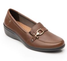 Step out in style with these comfortable and casual women's shoes from Flexi. The round toe and pull-on closure make them easy to wear, while the brown leather upper, standard shoe width, and stylish loafer design make them a great addition to any outfit. Perfect for any season, these shoes are a must-have for any fashion-forward woman. Brown Slip-ons With Removable Insole For Office, Brown Round Toe Slip-ons For Business Casual, Brown Slip-ons With Ortholite Insole For Business Casual, Brown Loafers With Cushioned Footbed For Office, Brown Cushioned Loafers For Office, Brown Ortholite Insole Slip-ons For Business Casual, Elegant Brown Moccasins With Cushioned Footbed, Brown Leather Footbed Slip-ons For Office, Brown Loafers With Ortholite Insole For Work