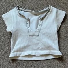 This Top Is Like Brand New, And Doesn’t Have Any Stains Or Anything. It’s A Size M/L, But Since It’s Been Washed It Fits Like A Size Small In My Opinion. It Fits Me And I’m 5’5, About 120 Lbs. Urban Outfitters White V-neck Tops, Urban Outfitters White Short Sleeve Crop Top, White Short Sleeve Crop Top By Urban Outfitters, Fitted White Top From Urban Outfitters, Fitted White Top By Urban Outfitters, White Stretch Top By Urban Outfitters, Trendy White Tops From Urban Outfitters, Urban Outfitters Trendy White Tops, Casual White Urban Outfitters Crop Top