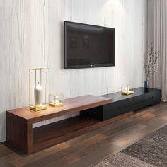 a flat screen tv mounted to the side of a wooden entertainment center in a living room