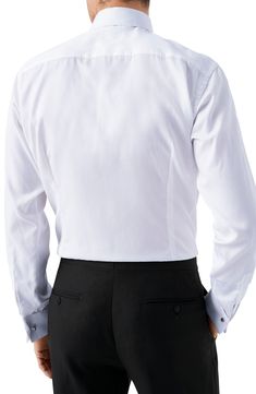 A diamond-dobby texture elevates the sophistication of this meticulously tailored tuxedo shirt cleanly crafted with a hidden button placket and French cuffs. 30 1/2" length; 43" chest (size 16.5) Hidden button placket Spread collar with permanent collar stays Long sleeves with French cuffs Back yoke Curved hem 100% cotton Machine wash, line dry Imported Men's Furnishings Elegant Formal Tops With Concealed Placket, Elegant Dress Shirt With Concealed Placket For Work, Formal Slim Fit Top With Concealed Placket, Formal Tops With Concealed Placket And Slim Fit, Elegant Business Casual Tuxedo With Hidden Button Closure, Elegant Tailored Shirt With Concealed Placket, Tailored Timeless Formal Tops, Timeless Formal Tops With Concealed Placket, Timeless Formal Top With Concealed Placket