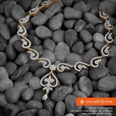 A beautiful blend of tradition & style, a very pretty #gold #diamond #necklace from our jewellery collection.  Click here to view more: http://bit.ly/1iqPQoi  #jewelerycollection #indianjewellery #jewellerylove #marathi #traditionaljewellery #goldjewellery #ethnicjewellery #wedding #indianwedding Diamond Bracelet Design, Diamond Jewelry Necklace, Diamond Necklaces, Necklace Diamond, Gold Diamond Necklace, Bracelet Design, Floral Jewellery