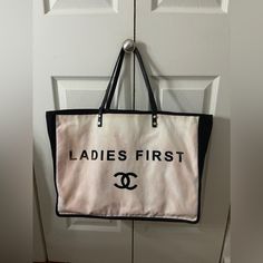 Chanel Ladies First Shopping Tote From The 2014-2015 Collection By Karl Lagerfeld White Canvas Interlocking Cc Logo Silver-Tone Hardware Leather Trim Dual Shoulder Straps Leather & Grosgrain Accents Canvas Lining & Dual Interior Pockets Open Top Height: 13.5" Width: 17.5" Depth: 3" Shoulder Strap Length: 7.5" Notes: Check Photos, Discoloration All Throughout The Bag. No Rubs Or Tears. Serial Number Intact. Comes With The Chanel Whistle Accessory. Designer Bags In Monogram Canvas With Silver-tone Hardware, Luxury Canvas Bags With Silver-tone Hardware, Chanel Shopping Tote, Chanel Large Shopping Bag, Shopping Tote, White Canvas, Womens Tote Bags, Leather Trims, Chanel Bag