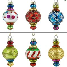 four different colored glass ornaments hanging from strings