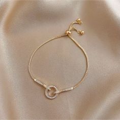 This Elegant Piece Is For You To Stay. It's Available In Gold Only. It Has Beautiful Diamond Stone That Will Make You Stand Out. This Forever Bracelet Can Be A Gift To A Special Person Or For You That Well Deserve It. Trendy Round Charm Bracelet With Adjustable Chain, Adjustable Chain Round Bracelet For Party, Trendy Round Bracelets With Adjustable Chain, Elegant Adjustable Circular Chain Bracelet, Elegant Chain Bracelets For Jewelry Making, Everyday Gold Round Crystal Bracelet, Trendy Round Chain Bracelet With Adjustable Chain, Adjustable Delicate Chain Bracelet, Crystal Chain Bracelet Gift