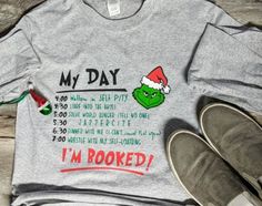 someone is wearing a shirt that says, my day i'm hooked up with elf