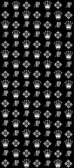 a black and white pattern with crowns on it