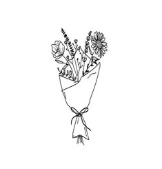 a bouquet of flowers is tied to a white paper with a bow on the end